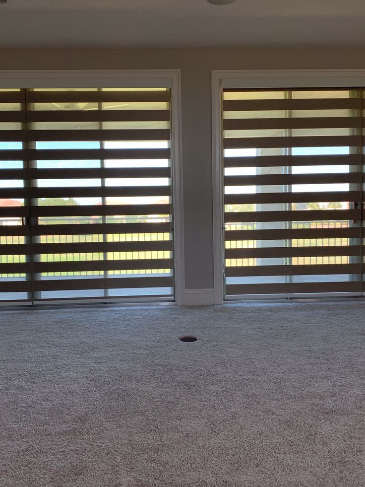 Motorized zebra shade mechanism showing band alignment options
