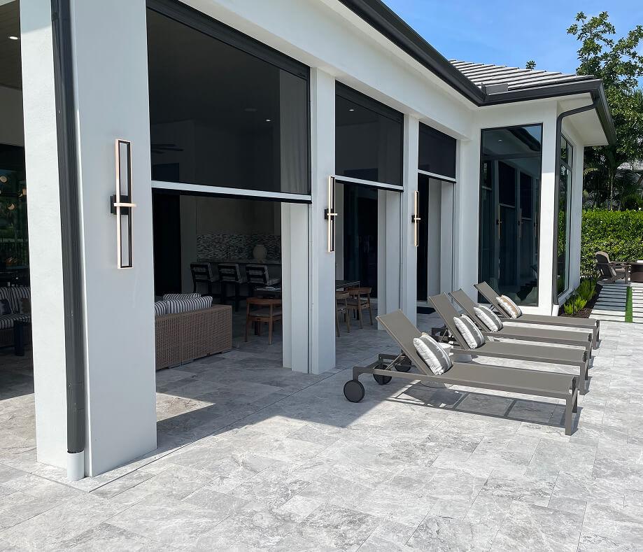 Motorized porch screen mechanism and housing